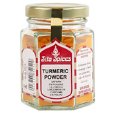 A 30g Sita Spices Turmeric Powder hexagonal glass jar with a gold lid, red and white multilingual labels, and natural health benefits highlighted.